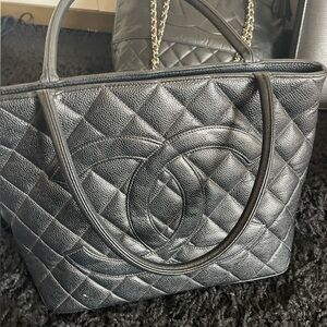 Authentic Chanel Caviar leather bag